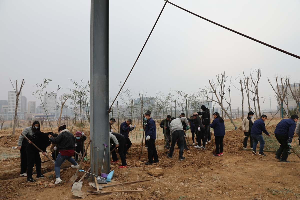 國(guó)泰科(kē)技(jì )舉行“你我攜手，美化公(gōng)司”植樹節活動